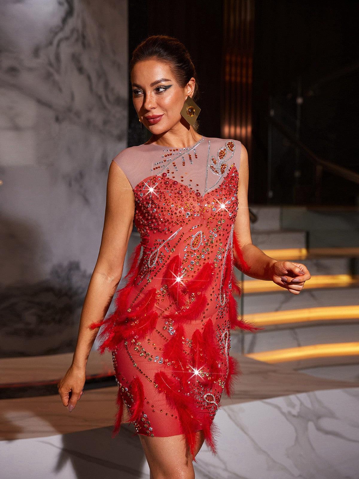 Goku Rhinestone Feather Mini Dress featuring elegant feathers and shimmering rhinestones, ideal for chic evening wear.