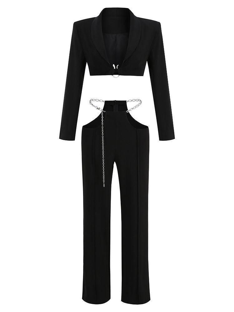 Gwyneth Plunge Chain Cutout Blazer Set in Black, featuring a stylish blazer with cutouts, tailored pants, and a plunging neckline.