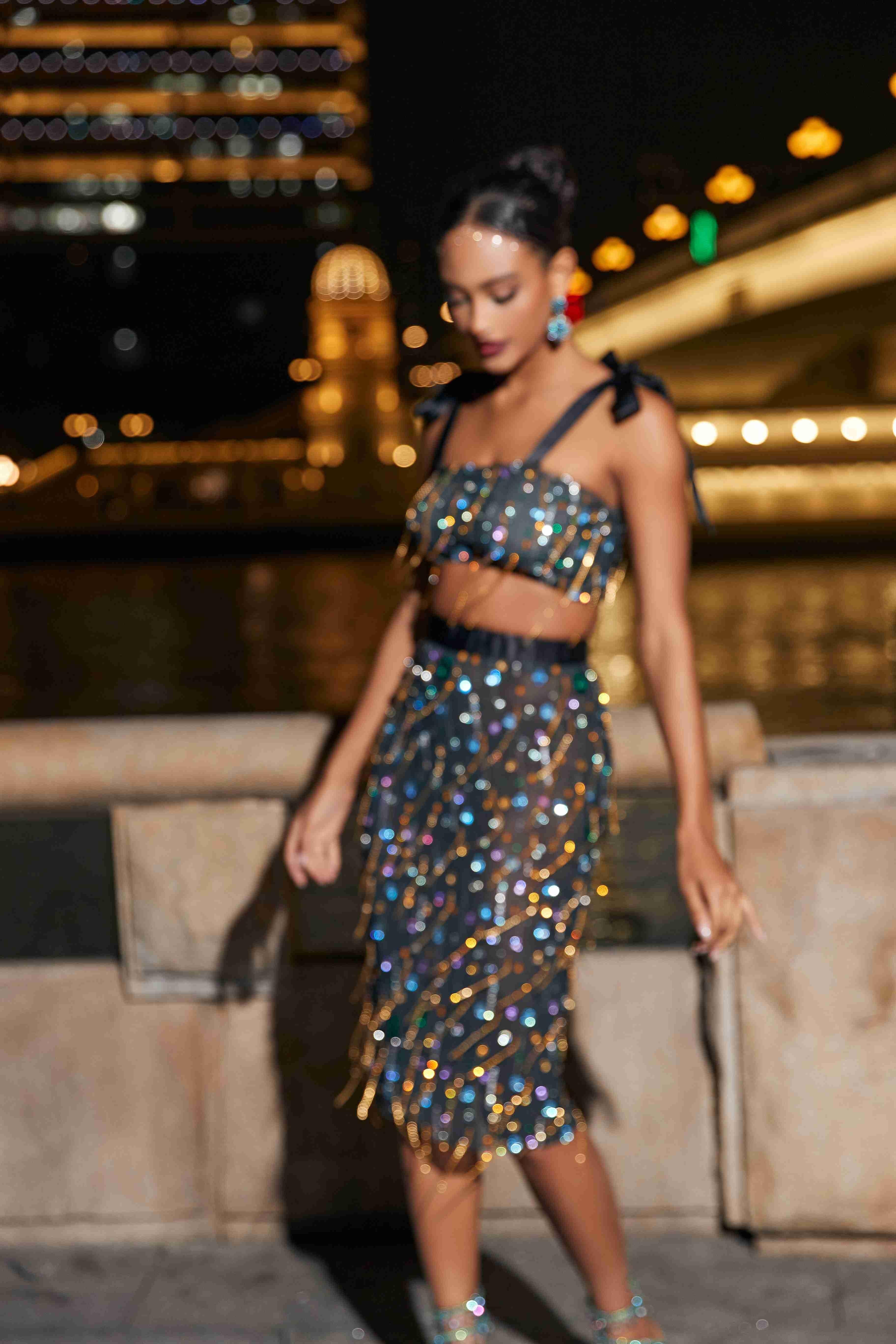 Haleli See Through Fringe Rhinestone Skirt Set showcasing sparkling details and a chic design, perfect for glamorous evening events.