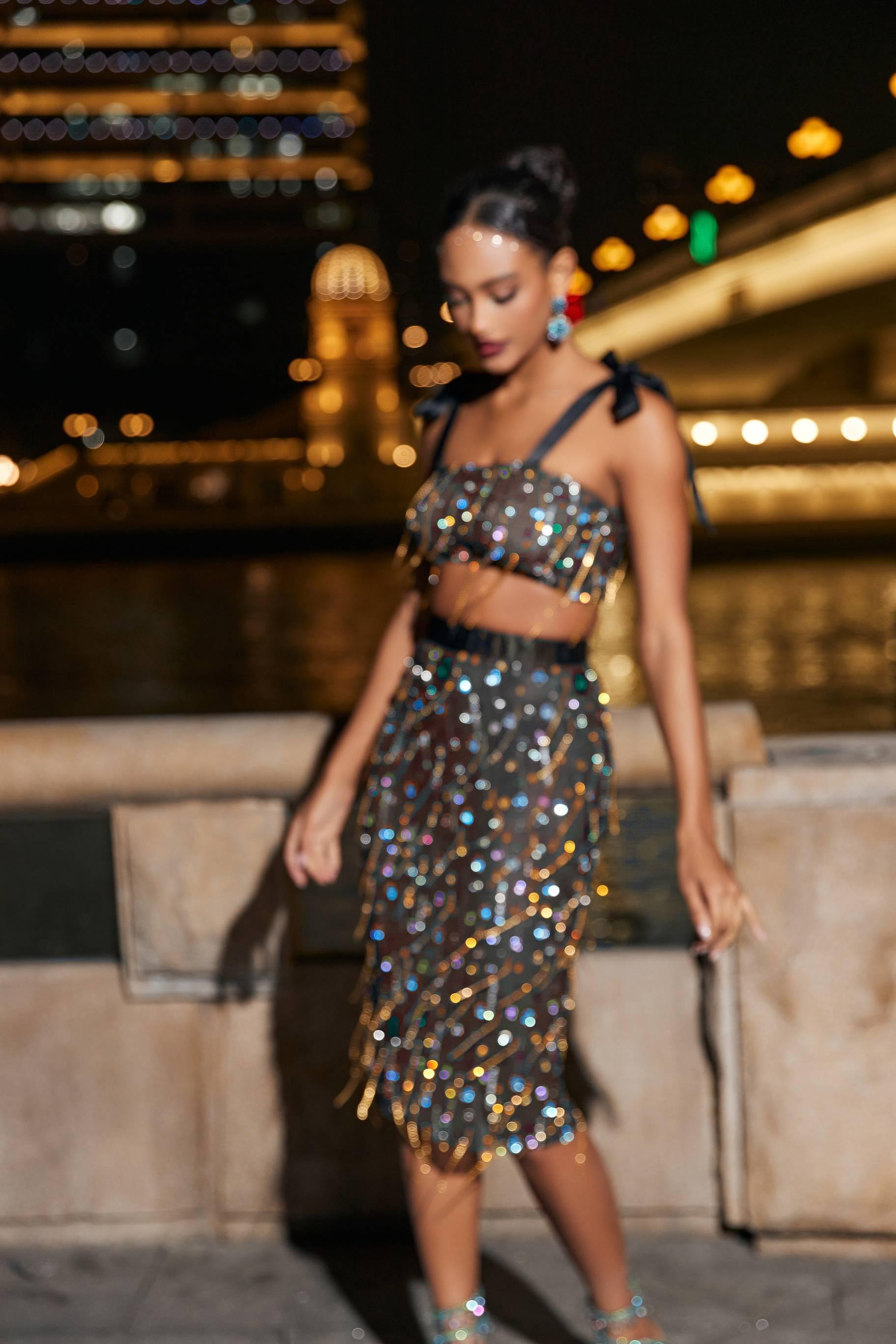 Haleli See Through Fringe Rhinestone Skirt Set showcasing sparkling details and a chic design, perfect for glamorous evening events.