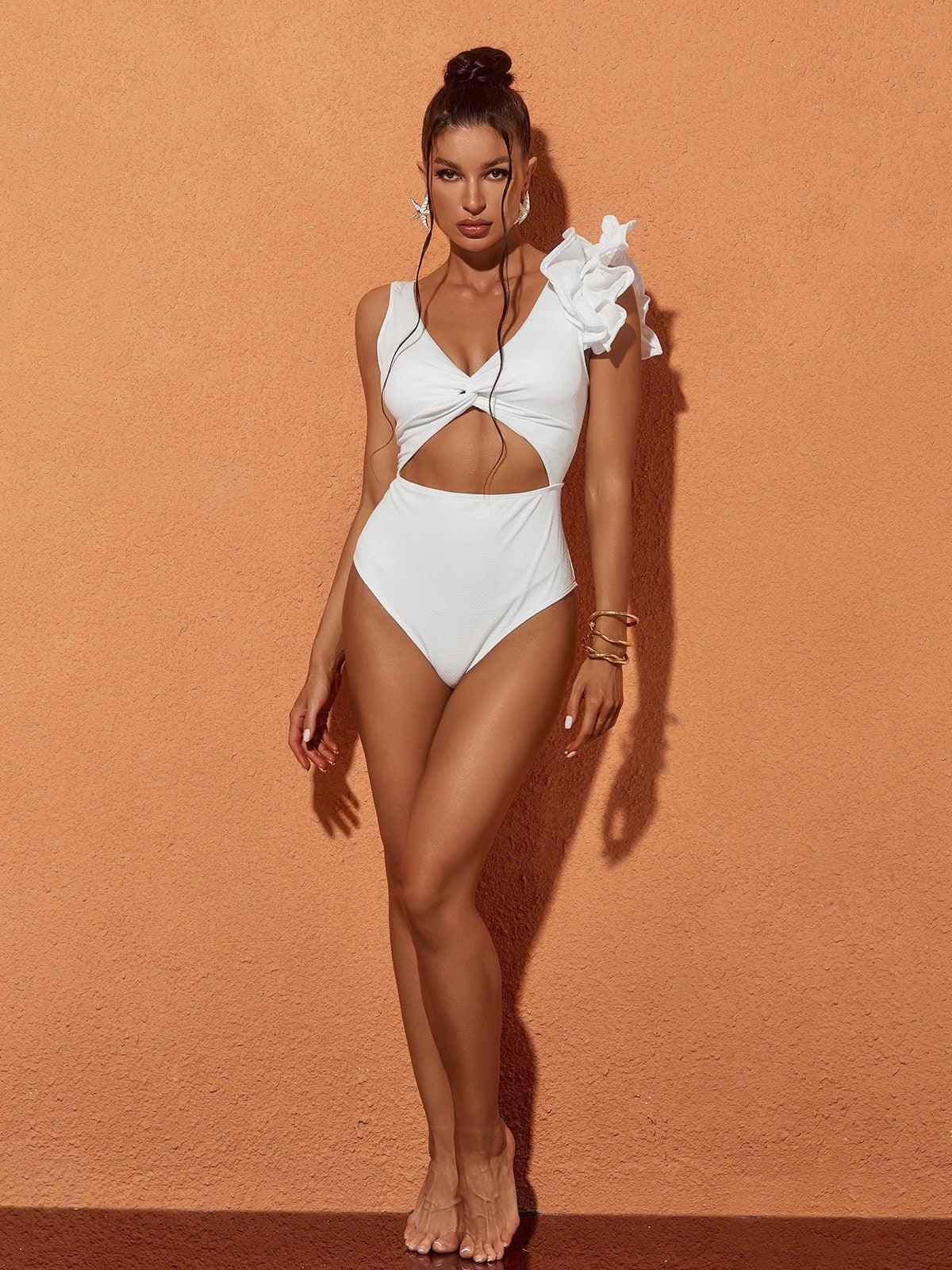 Heather Ruffle Cutout One Piece Swimsuit in white, featuring cutouts and ruffle details, ideal for stylish beach outings.