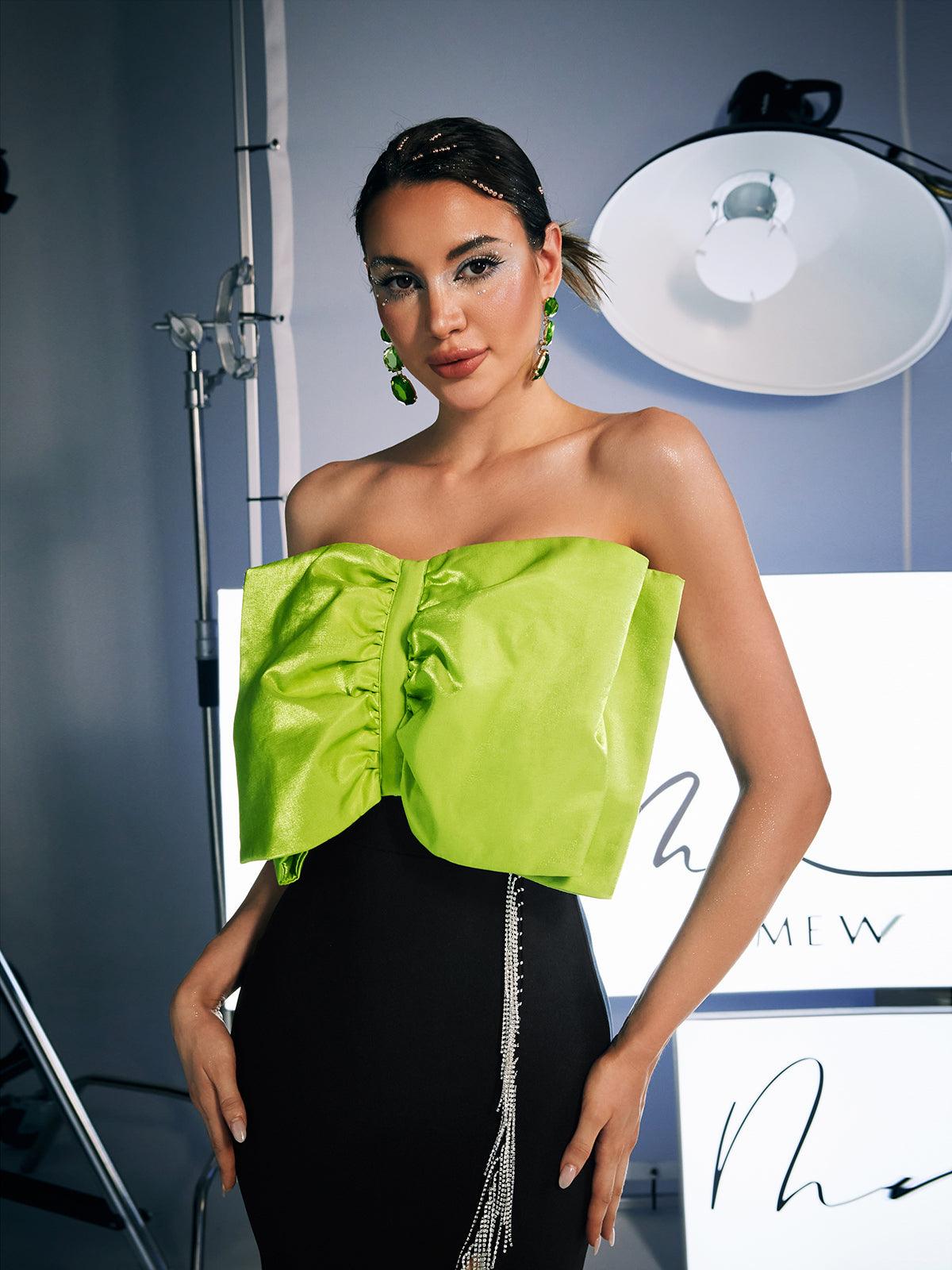 Idony Strapless Bow Crystal Fringe Mini Dress in Black, featuring a chic design with crystal fringe and a flattering silhouette.