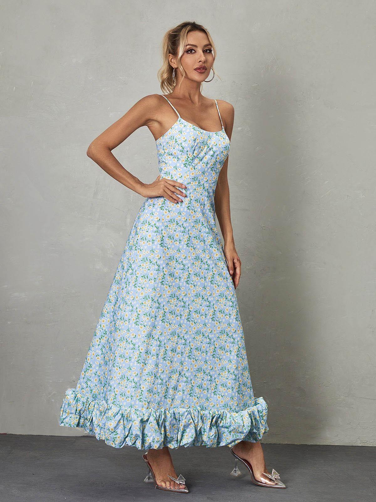 Ilsa Spaghetti Floral Maxi Dress in Blue, featuring a feminine floral design and elegant floor-length style, perfect for summer occasions.