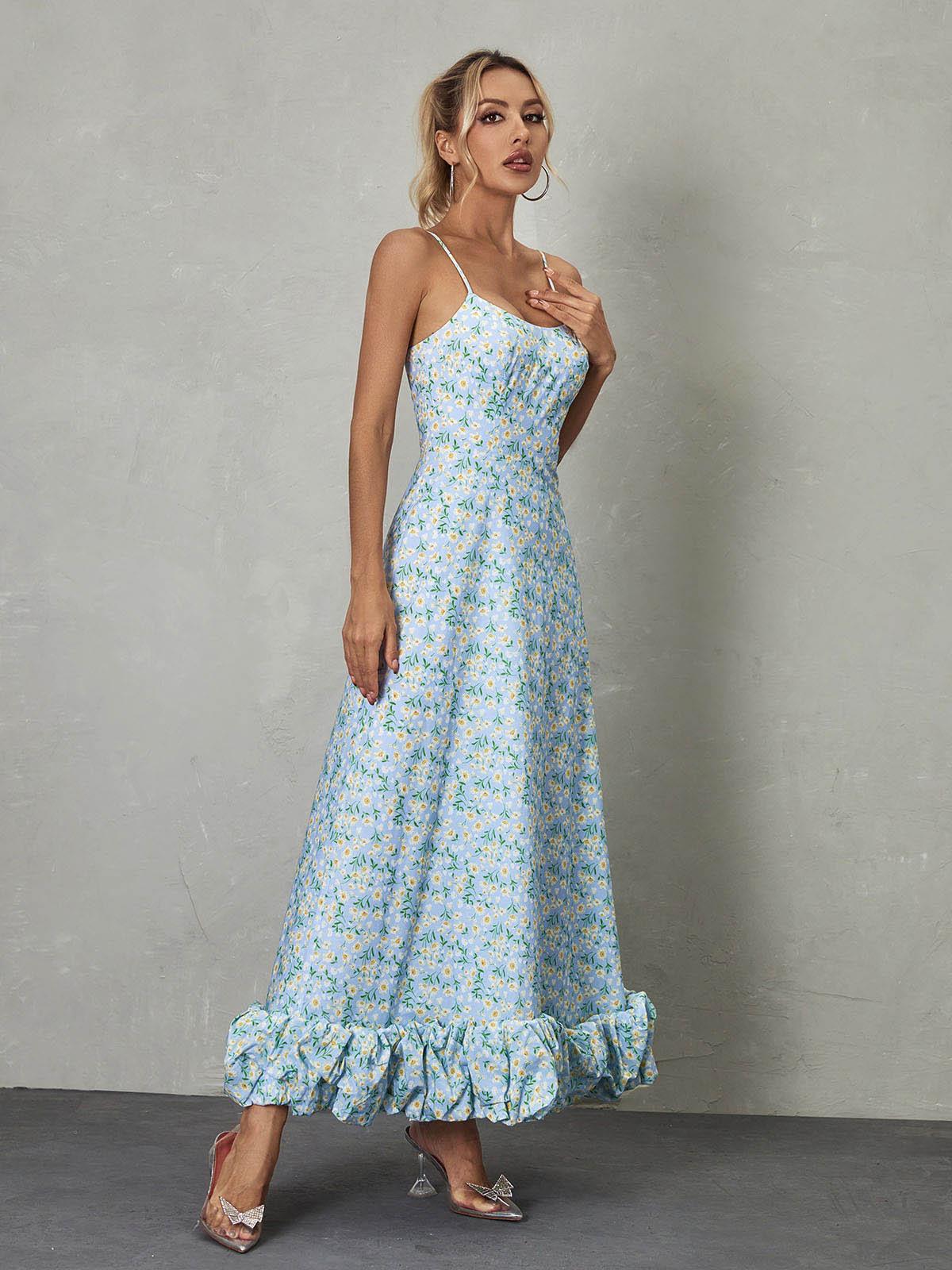 Ilsa Spaghetti Floral Maxi Dress in Blue, featuring a feminine floral design and elegant floor-length style, perfect for summer occasions.