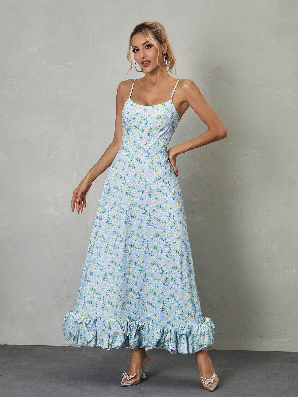 Ilsa Spaghetti Floral Maxi Dress in Blue, featuring a feminine floral design and elegant floor-length style, perfect for summer occasions.