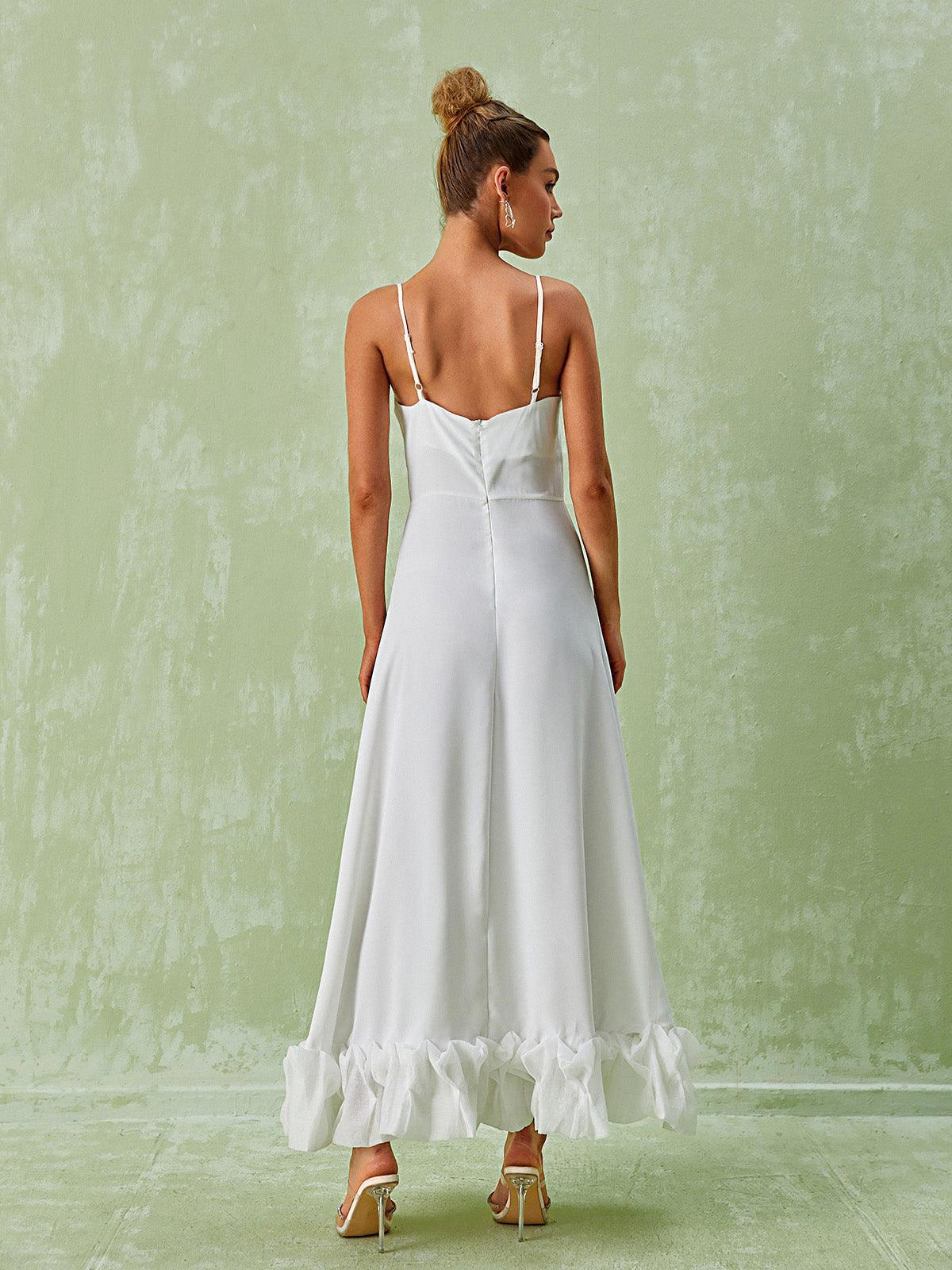 Elegant Ilsa Spaghetti Maxi Dress in White featuring a floral hem, ideal for summer vacations and formal events.