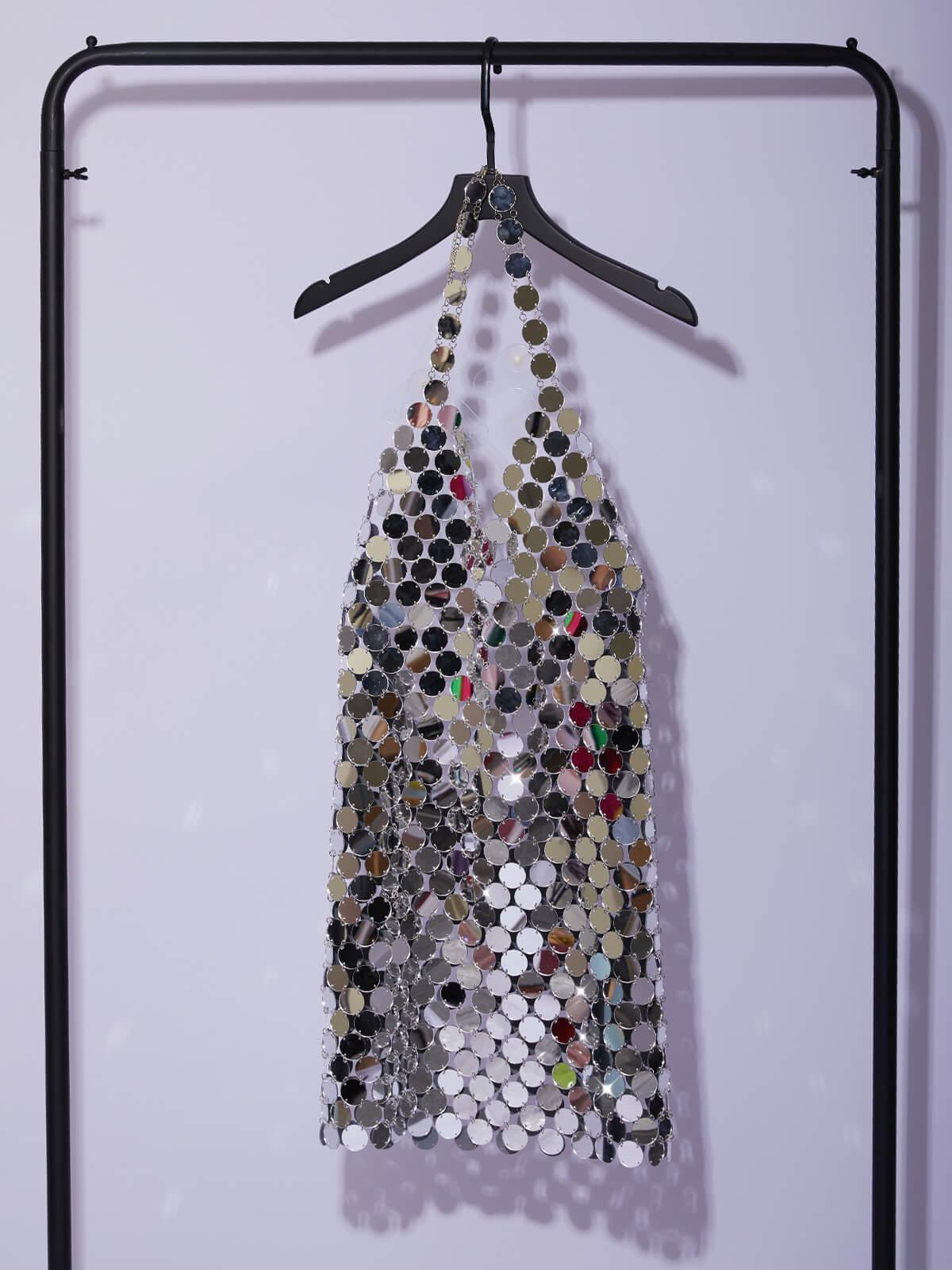 Irene Chainmail Mini Dress in Silver, a handcrafted backless design with shimmering details, ideal for festivals and parties.