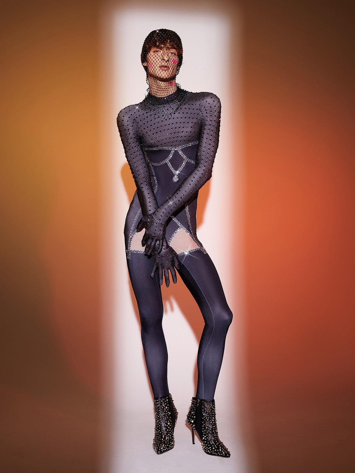Isaias Body Printed Rhinestone Gloves Jumpsuit in black, featuring unique glove design and rhinestone details for stylish events.