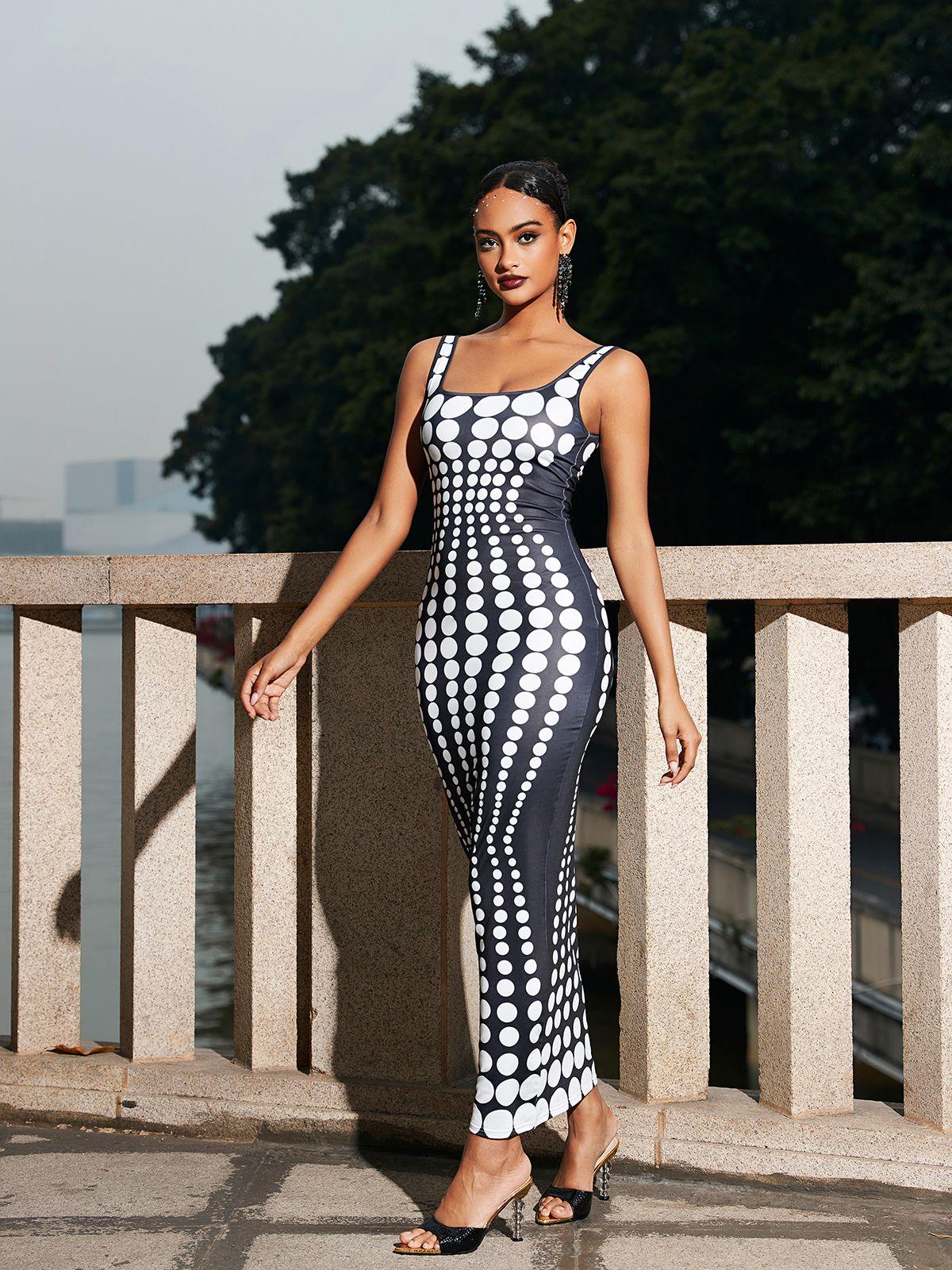Ishi Dot Printed Maxi Dress in White featuring a sophisticated design and breathable fabric, ideal for casual and elegant occasions.