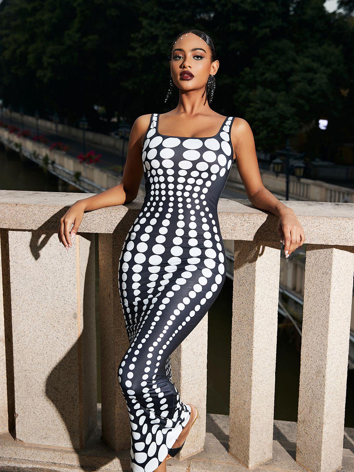 Ishi Dot Printed Maxi Dress in White featuring a sophisticated design and breathable fabric, ideal for casual and elegant occasions.