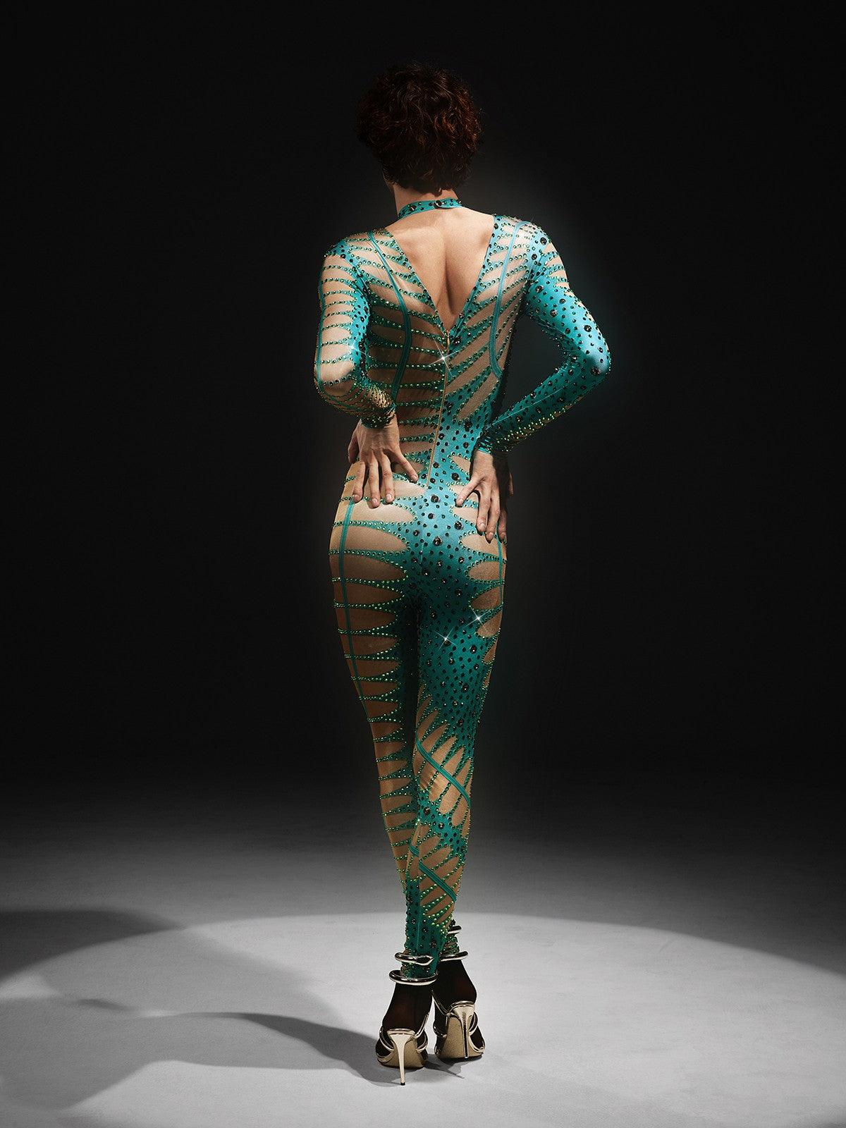Jadon Hollow Printed Rhinestone Jumpsuit in lake blue, featuring unique hollow print and elegant rhinestone embellishments.