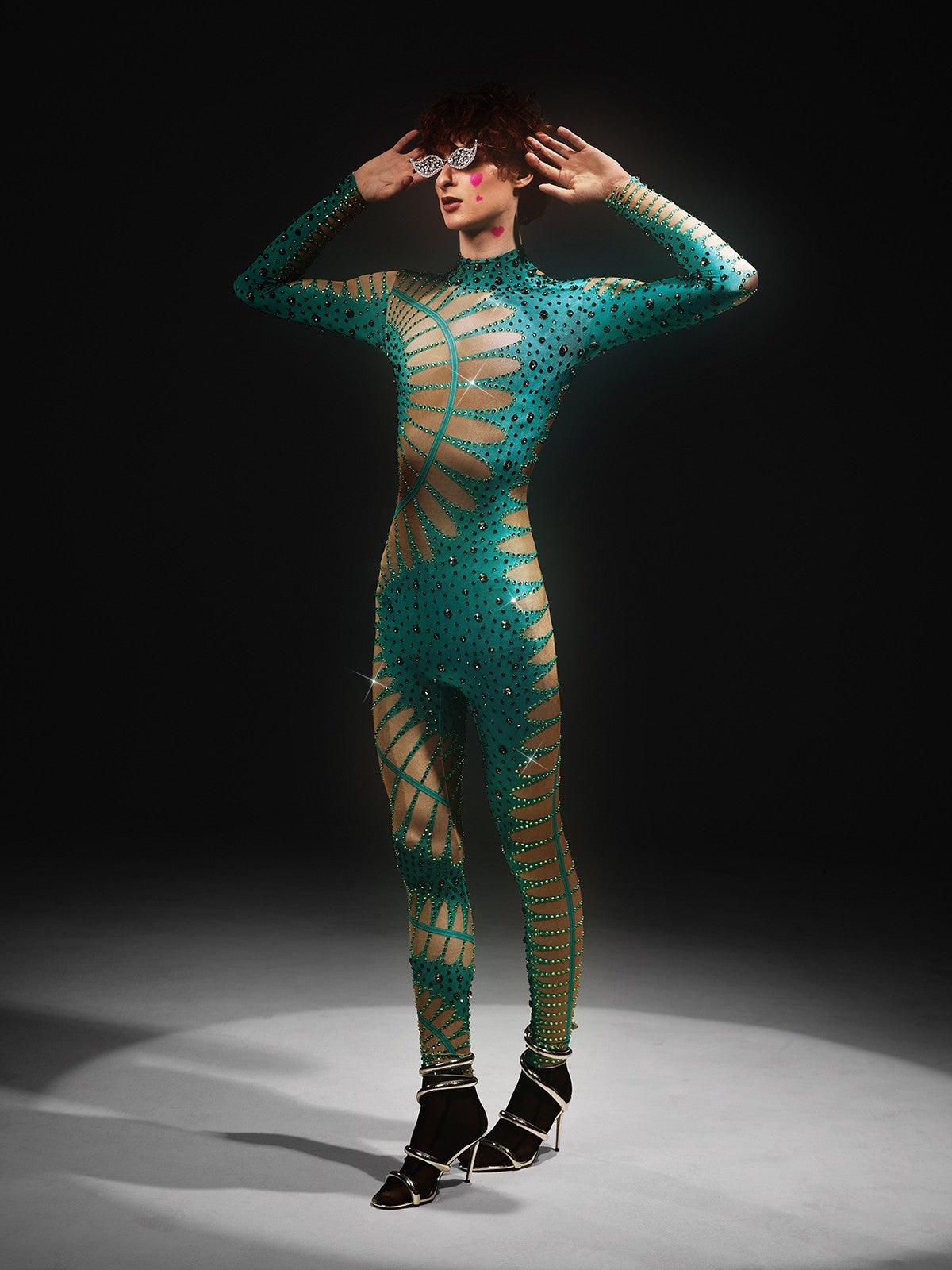 Jadon Hollow Printed Rhinestone Jumpsuit in lake blue, featuring unique hollow print and elegant rhinestone embellishments.