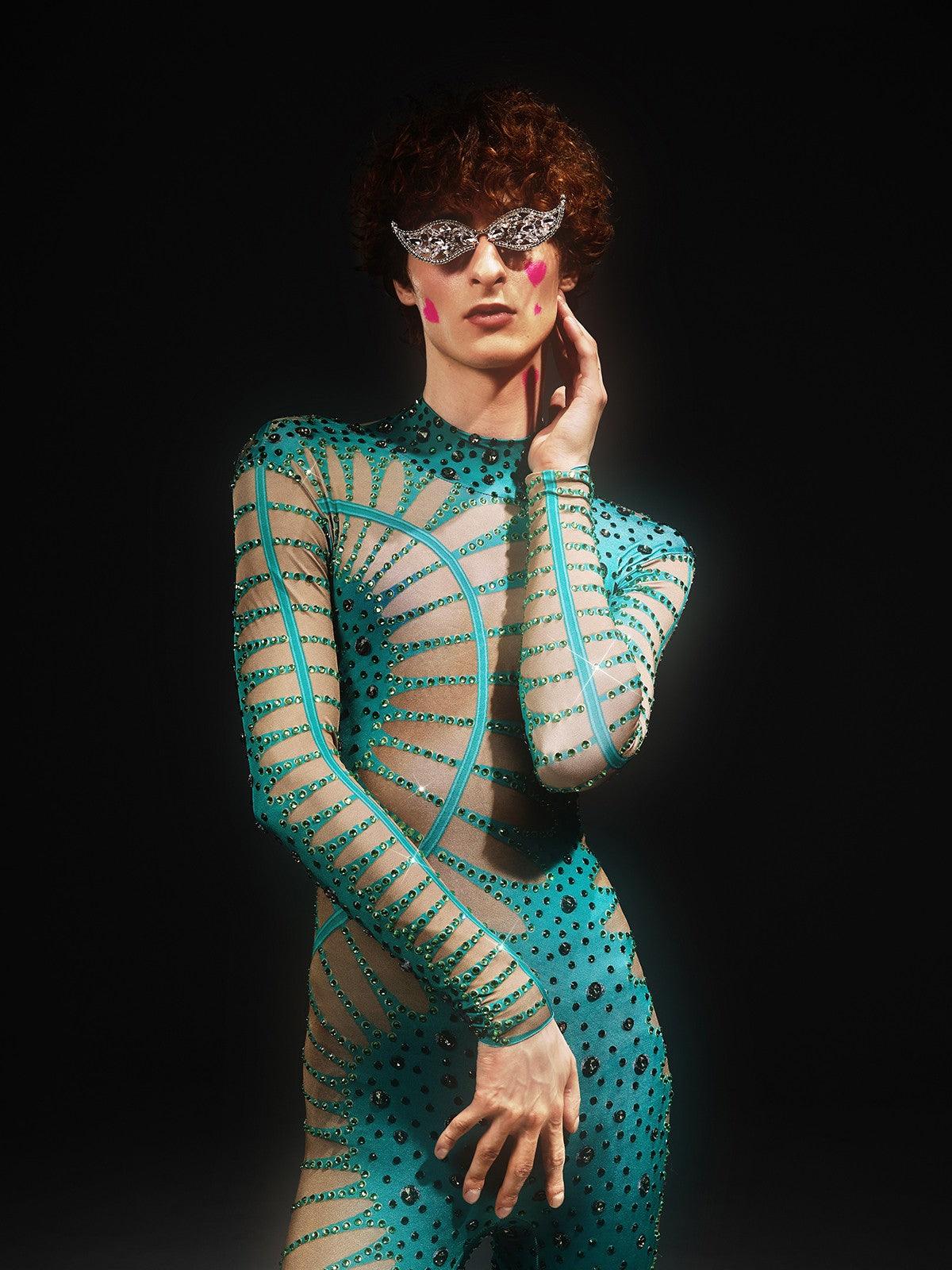 Jadon Hollow Printed Rhinestone Jumpsuit in lake blue, featuring unique hollow print and elegant rhinestone embellishments.