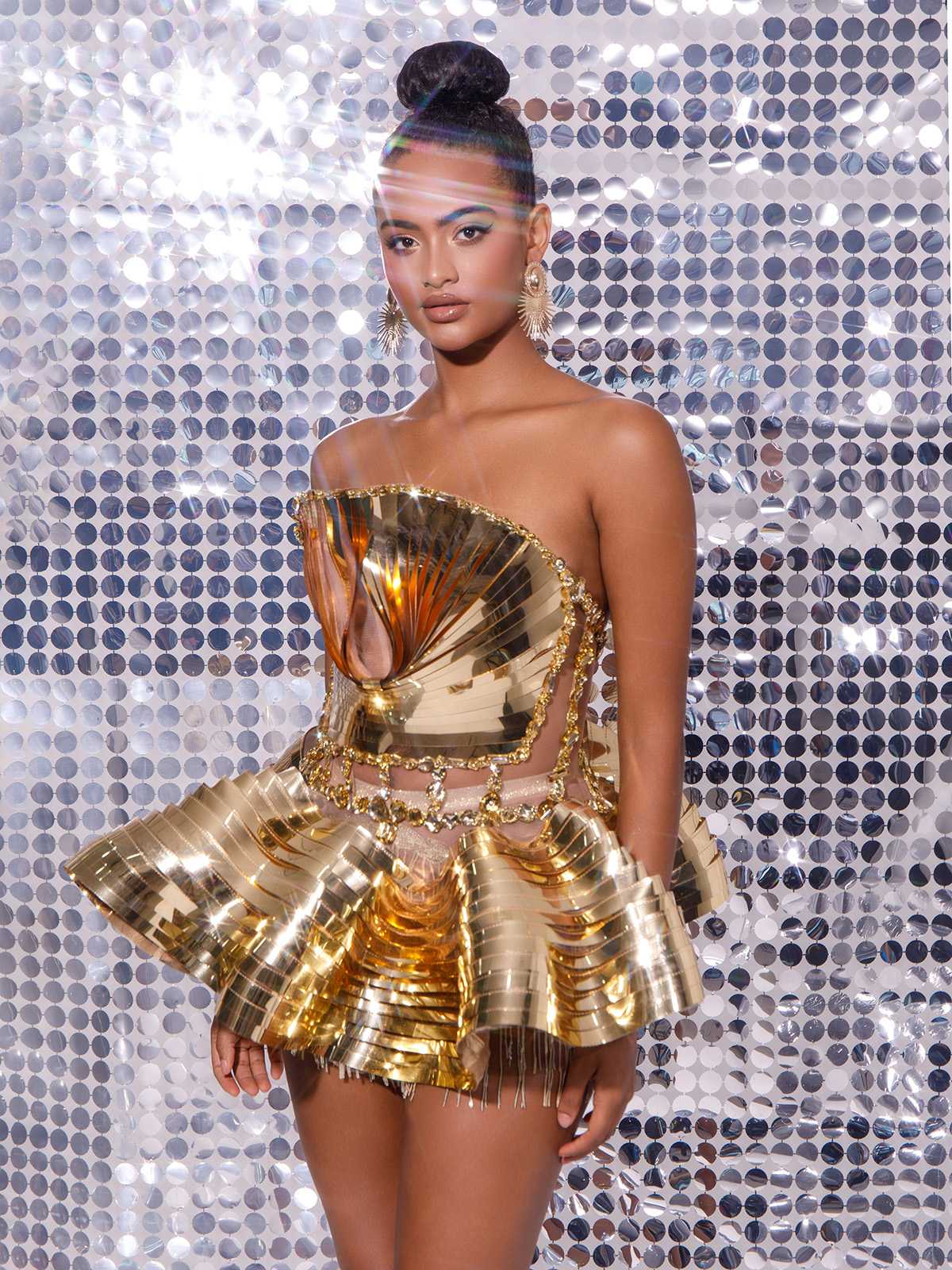 Jahdiel Crystal Fringe Metallic Skirt Set in Gold featuring sparkling crystals and a chic strapless design.