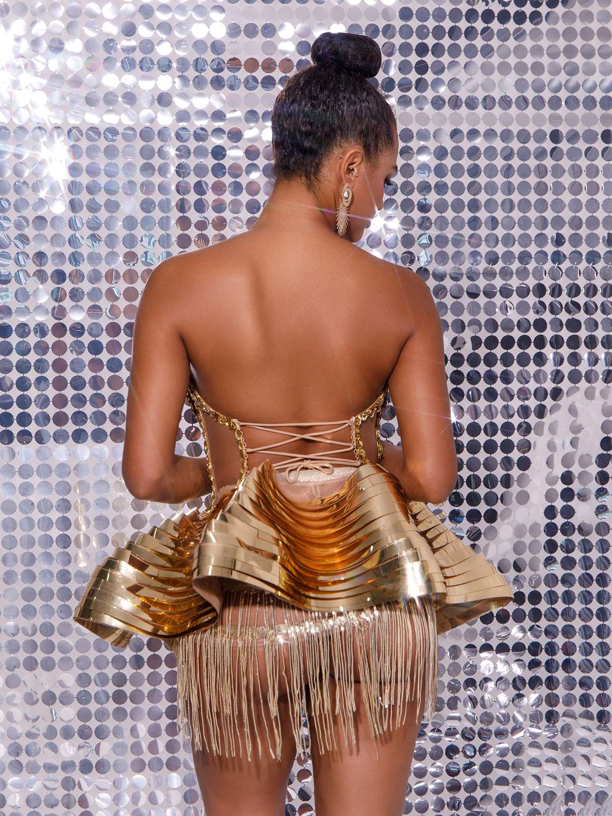 Jahdiel Crystal Fringe Metallic Skirt Set in Gold featuring sparkling crystals and a chic strapless design.