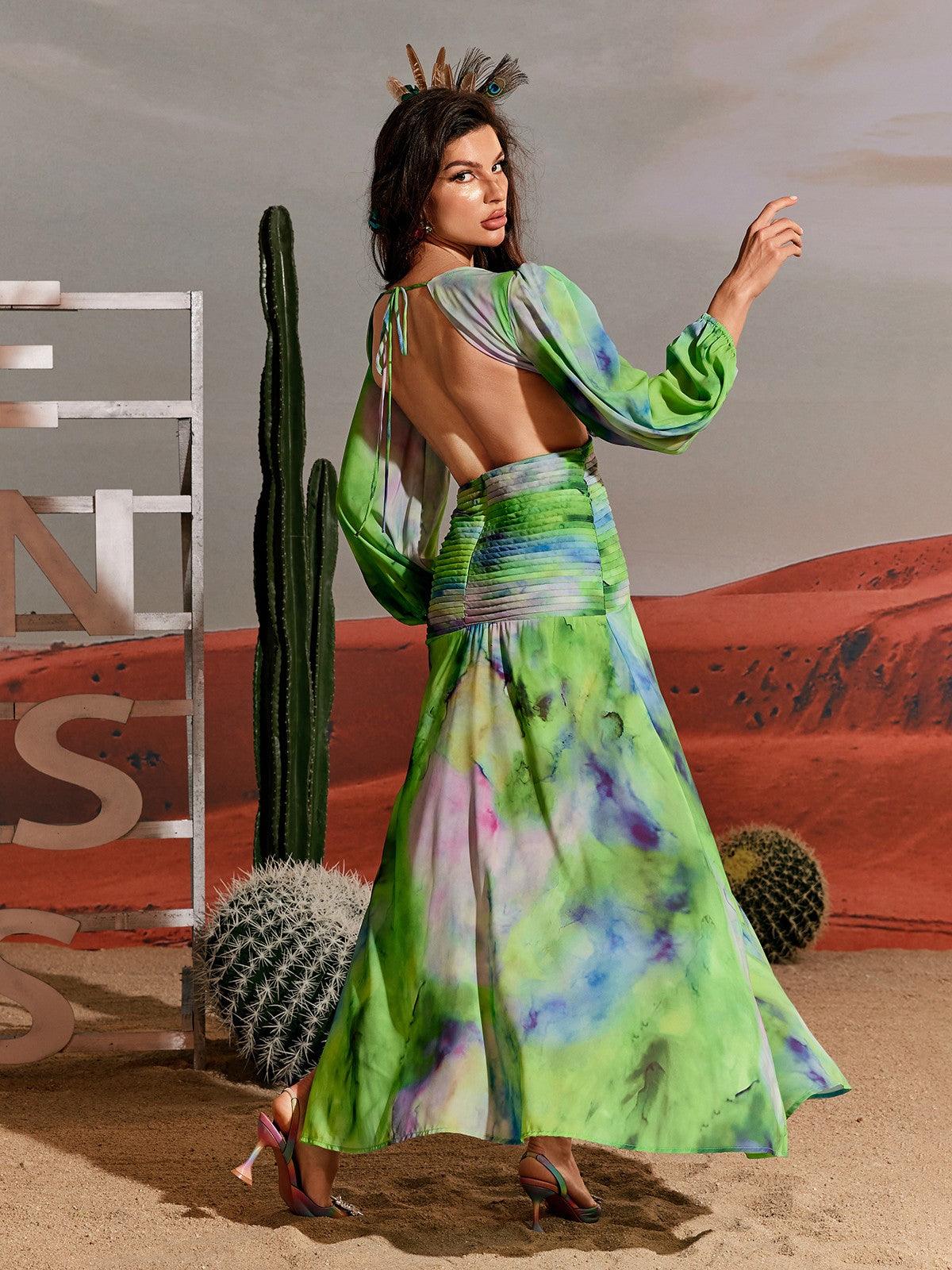Janay Printed Cutout Maxi Dress in green with long sleeves and a split, perfect for vacation or elegant events.