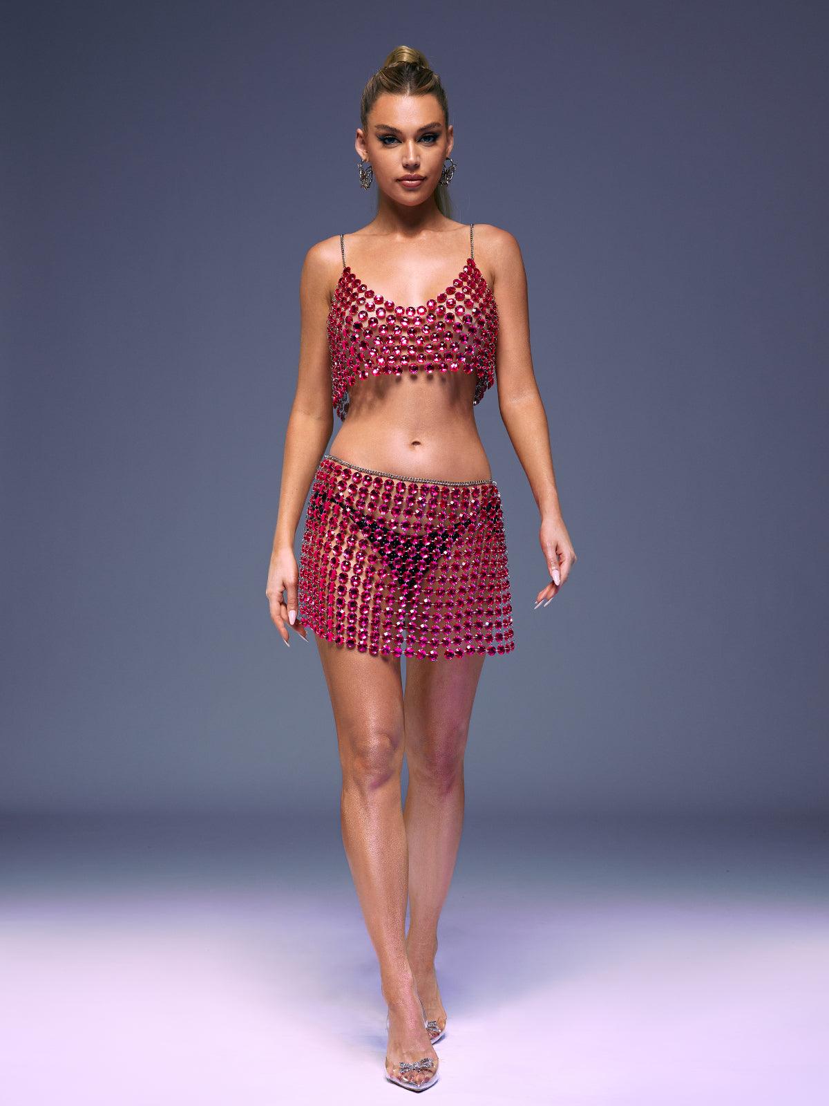 Jaslynn Chainmail Skirt Set in vibrant hot pink, showcasing a stylish mini skirt and spaghetti strap top, perfect for evening wear.