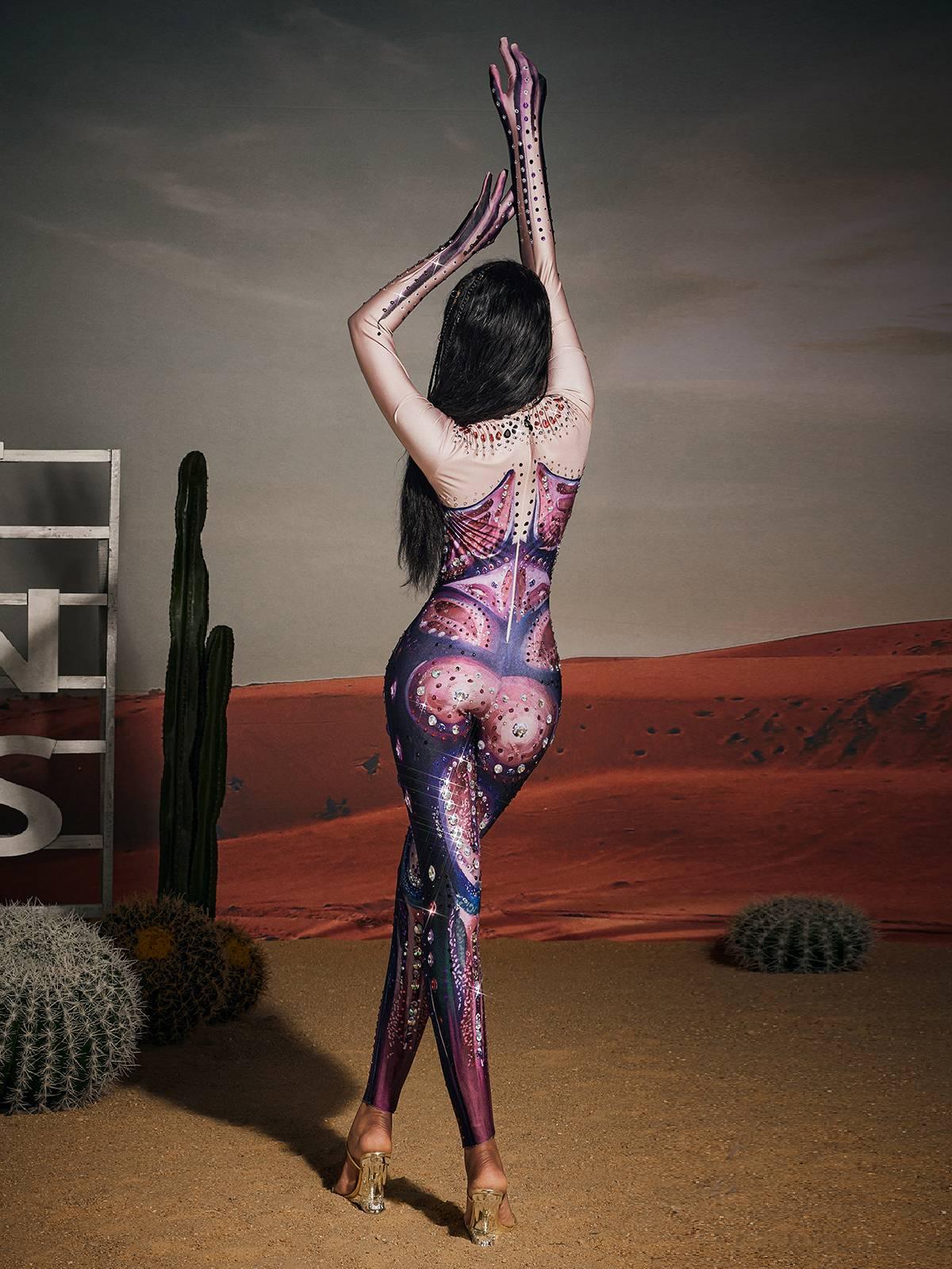 Jensen High Neck Printed Rhinestone Gloves Jumpsuit, featuring elegant rhinestones and a trendy high neckline for chic occasions.
