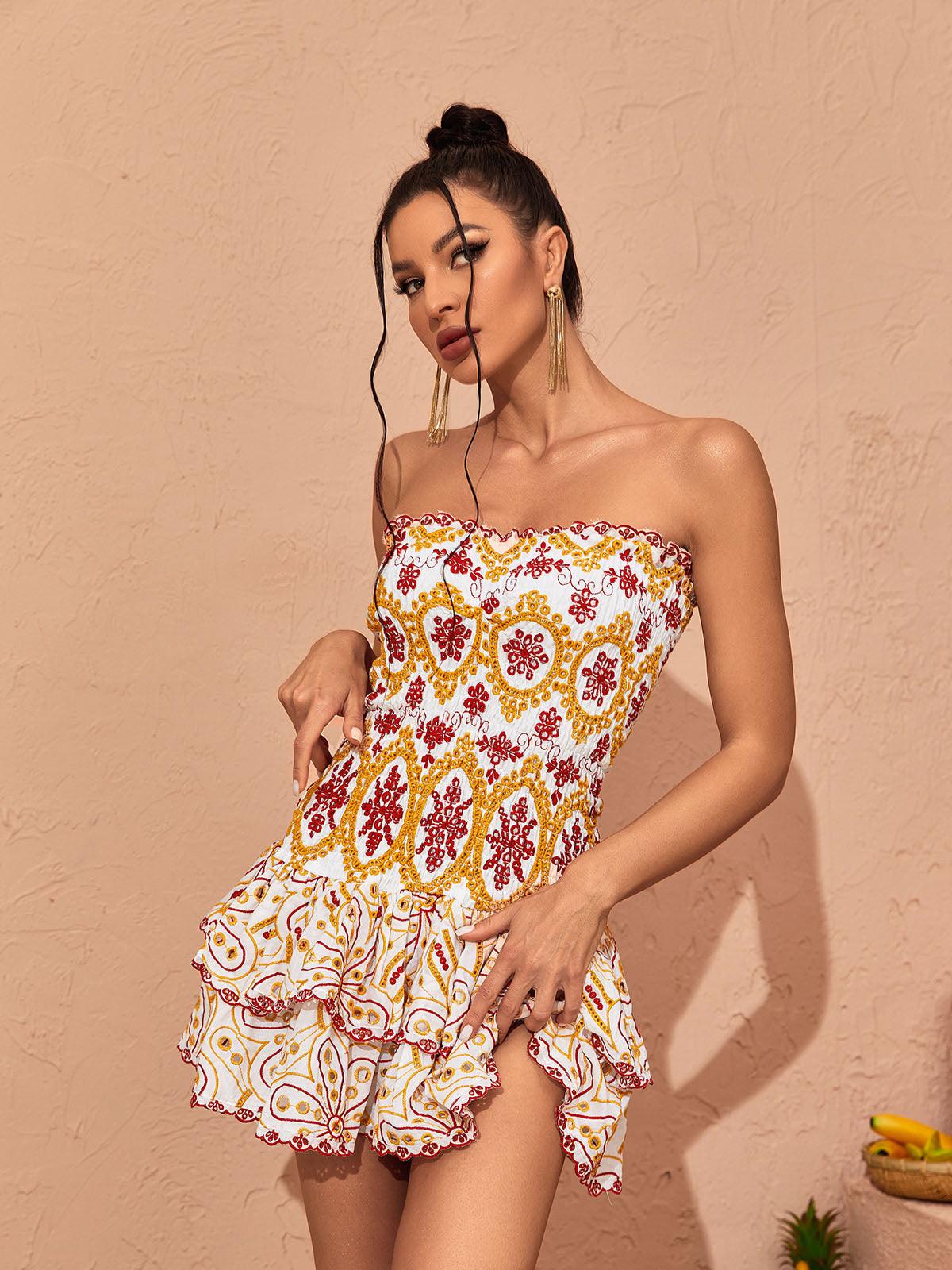 Judson Strapless Ruffle Mini Dress featuring a chic silhouette and eye-catching ruffle design, ideal for parties and casual brunches.