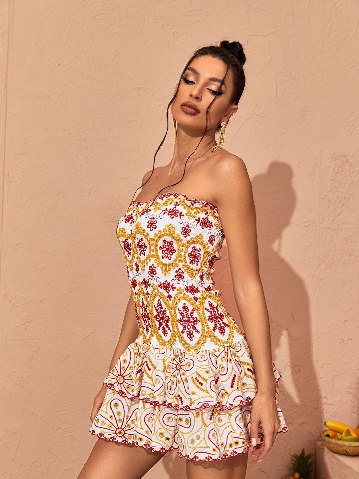 Judson Strapless Ruffle Mini Dress featuring a chic silhouette and eye-catching ruffle design, ideal for parties and casual brunches.