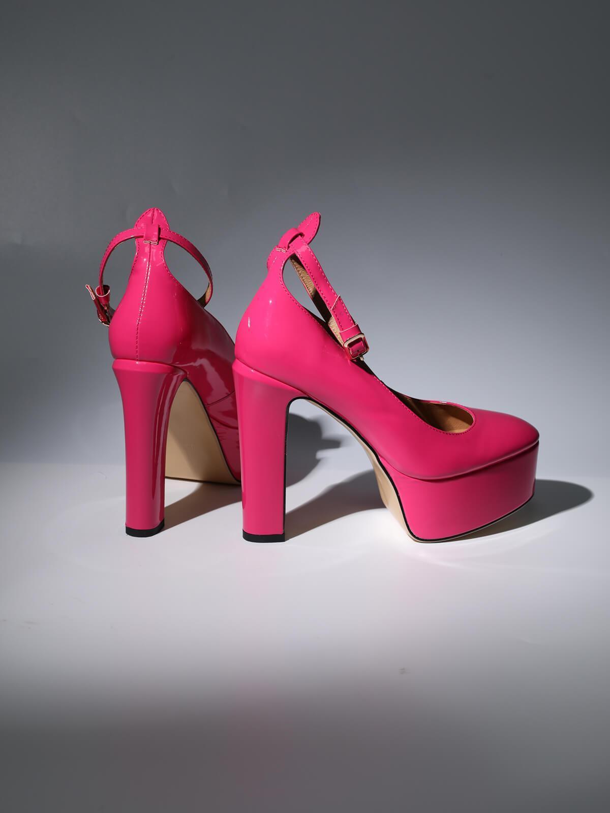 Kalea Leather Platform Heels in vibrant hot pink, perfect for stylish women's footwear on glamorous occasions.