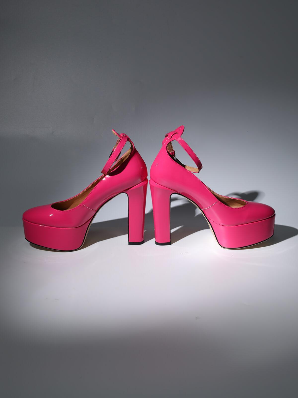 Kalea Leather Platform Heels in vibrant hot pink, perfect for stylish women's footwear on glamorous occasions.