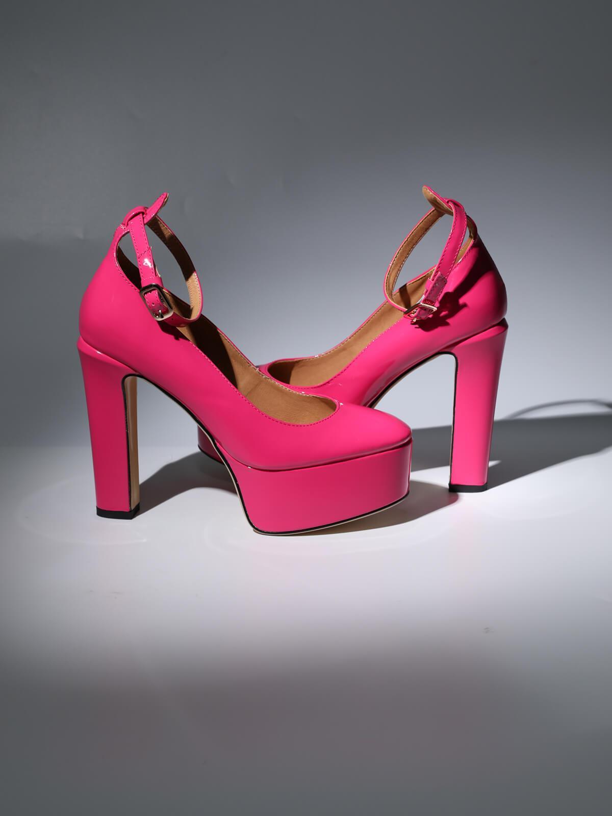 Kalea Leather Platform Heels in vibrant hot pink, perfect for stylish women's footwear on glamorous occasions.