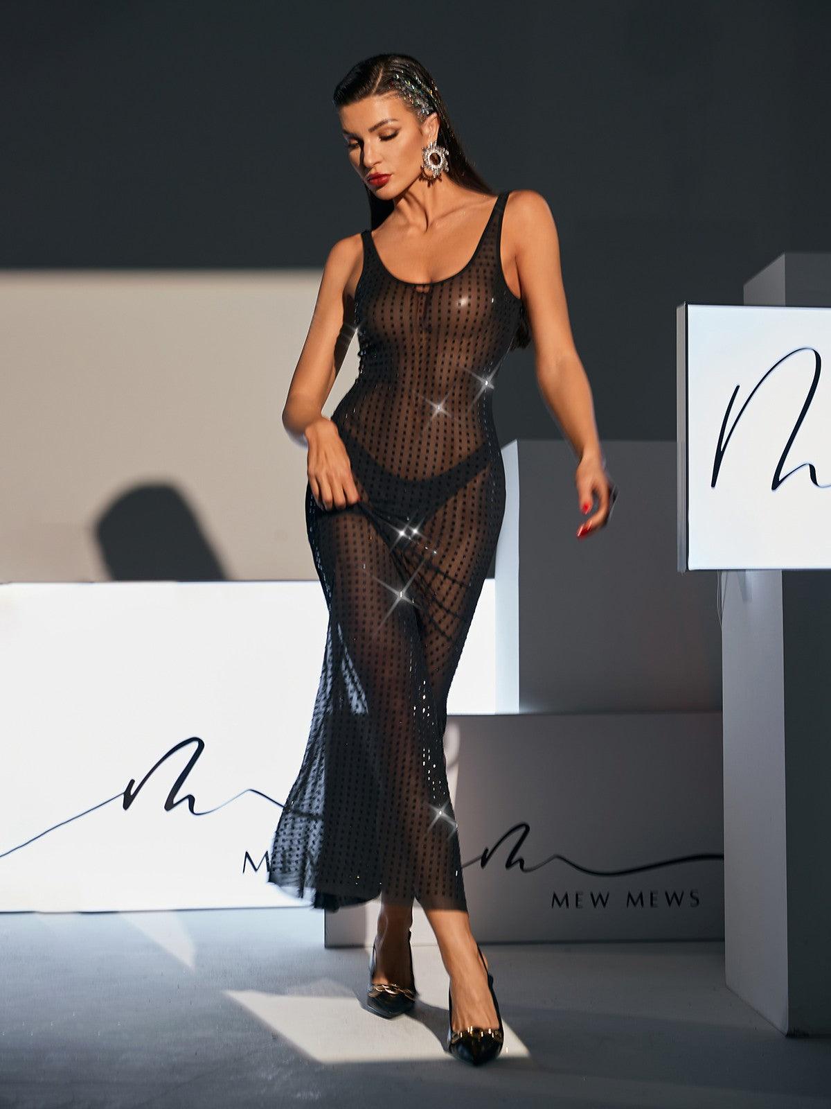 Elegant black backless maxi dress with embellished mesh detailing. Perfect for formal events or special occasions.  Shop the Karter dress now!