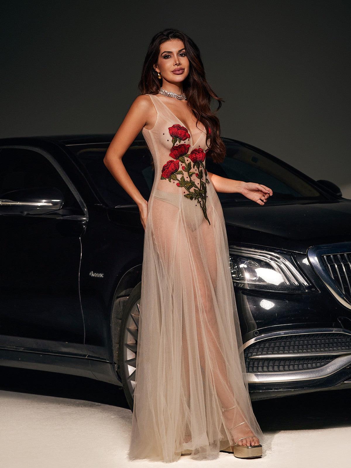 Elegant Kateri V-neck maxi dress in nude mesh with exquisite floral embroidery.  A sophisticated and romantic choice for weddings, parties, and special occasions.