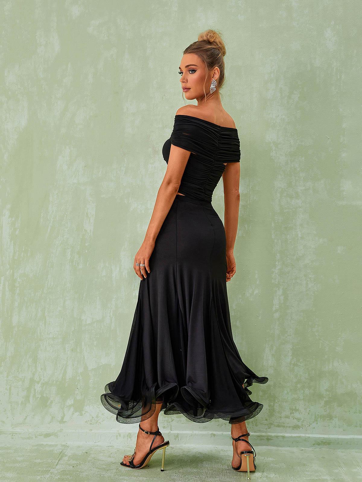 Elegant black maxi skirt with ruched and curling details. Flattering and versatile, perfect for any occasion. 100% polyester, easy care.