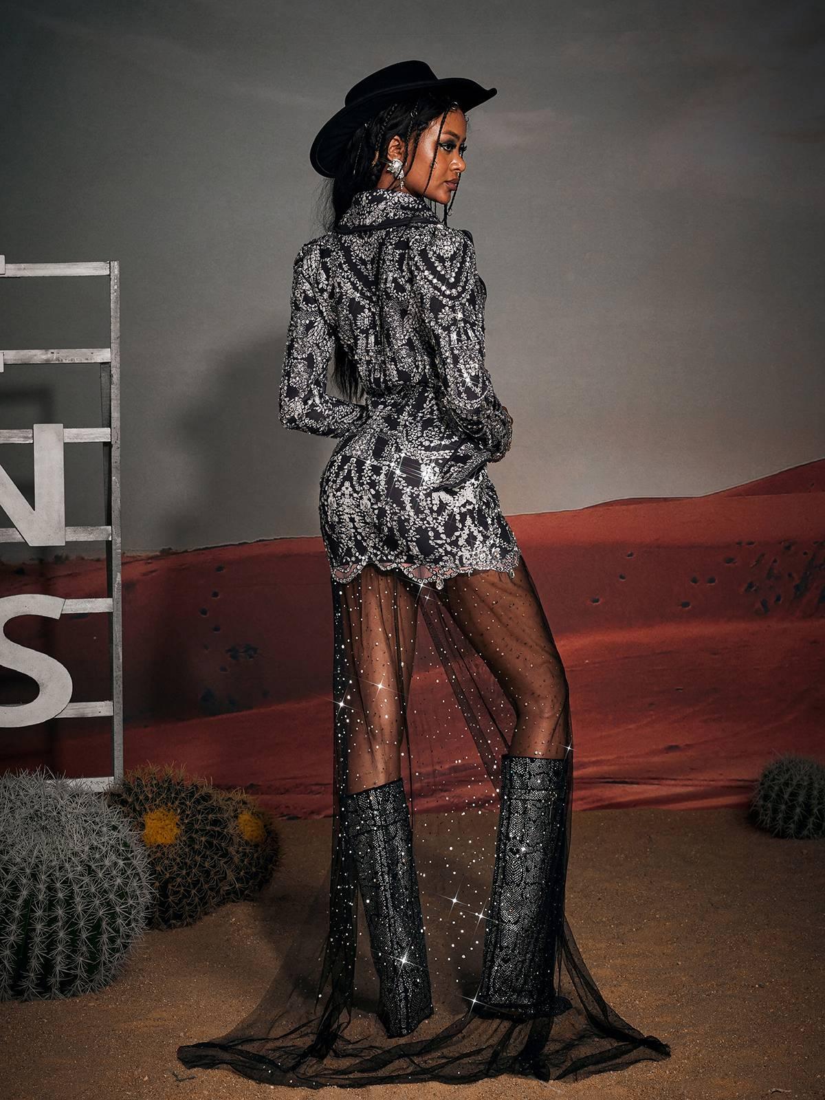 Kaysen black printed rhinestone draped blazer dress.  A chic, elegant maxi dress with long sleeves, perfect for parties and special events.  Features eye-catching rhinestone detailing.