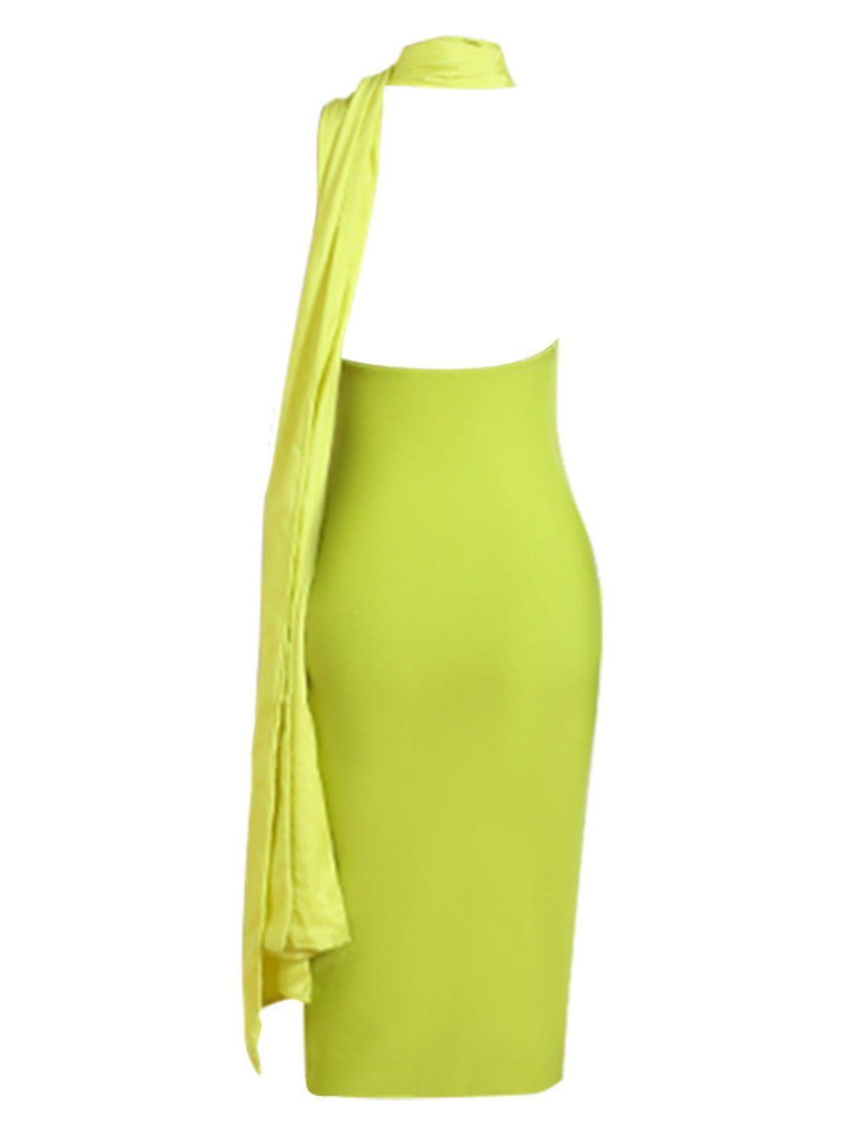 Model wearing a stunning chic green Kinga halterneck bandage midi dress with an open back, showcasing its figure-hugging fit and elegant design. Perfect for weddings or special occasions.