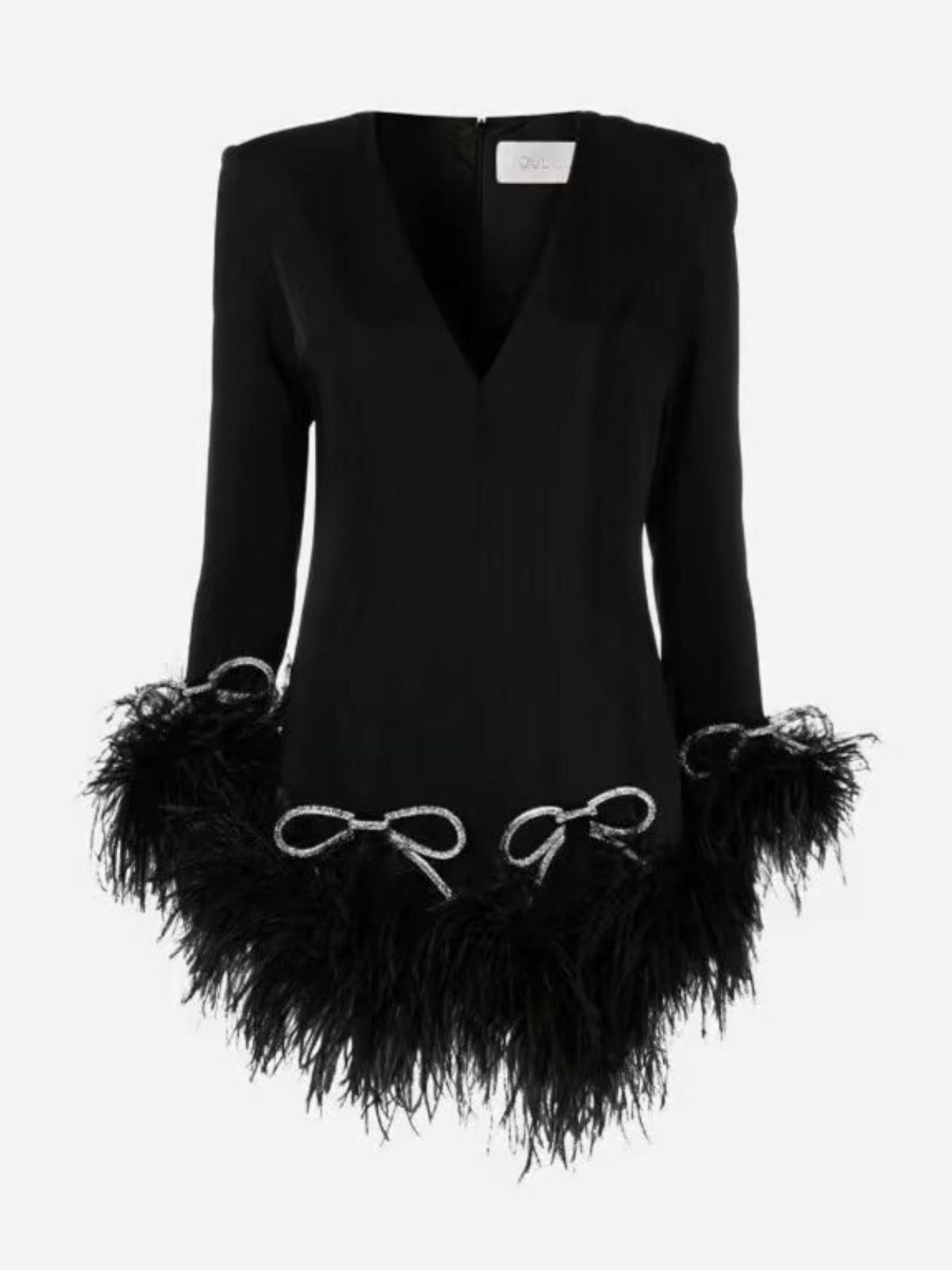 Koko Long Sleeve Bow Crystal Feather Dress featuring crystal embellishments and feather details, perfect for glamorous cocktail events.