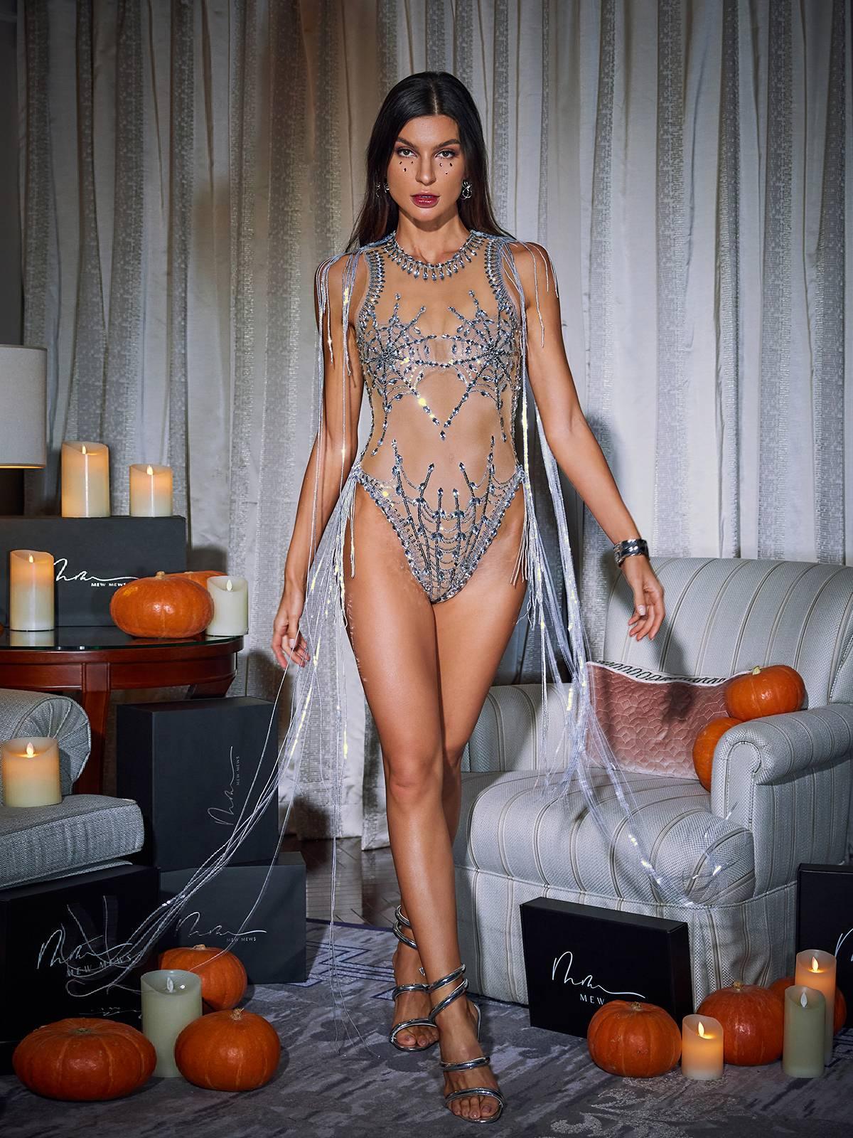 Lamia Cobweb Fringe Sequin Bodysuit featuring elegant sequin details, fringe accents, and mesh in a stylish nude color.
