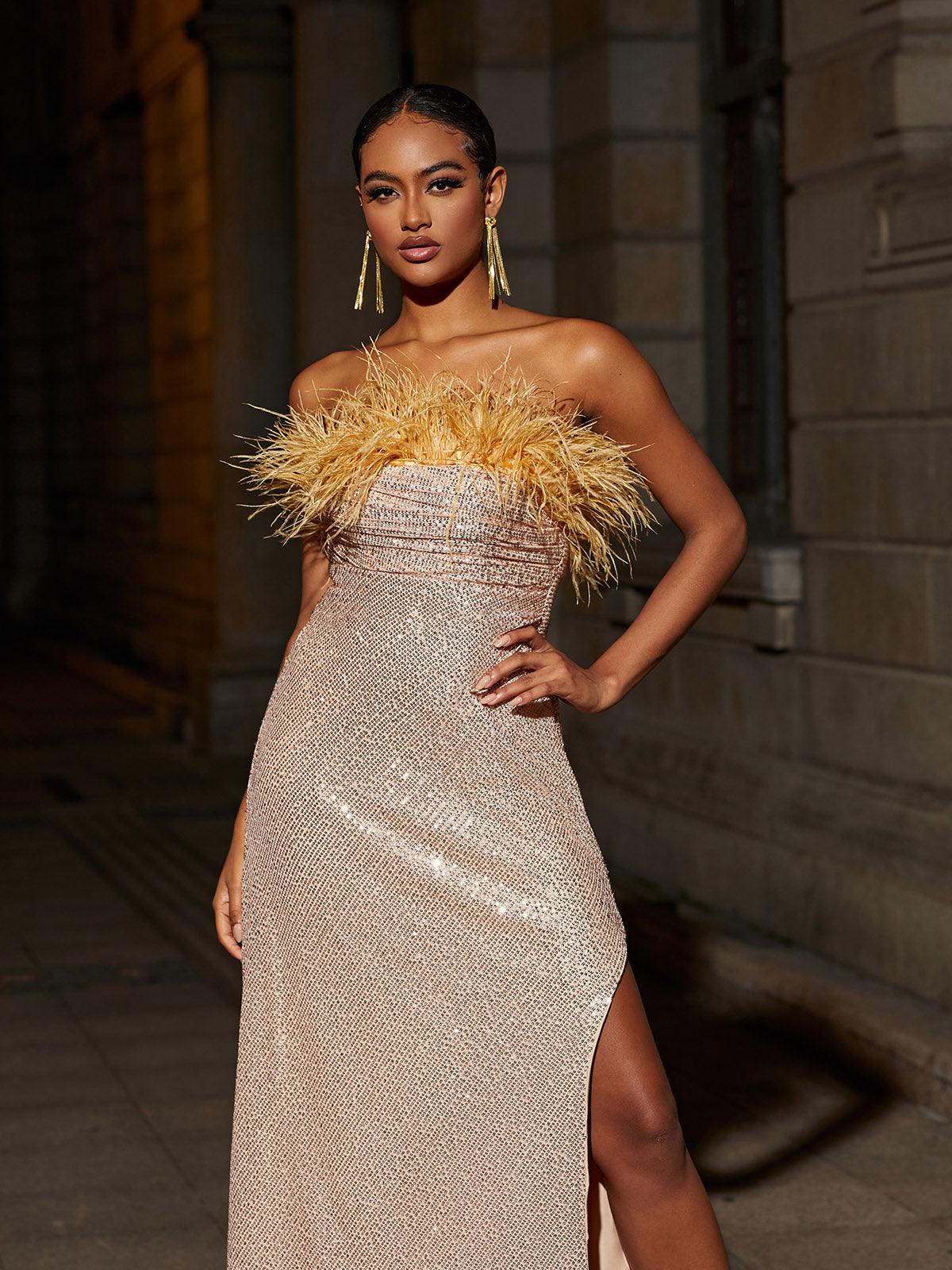 Laurell Strapless Feather Sequin Maxi Dress featuring a split design and luxurious sequins for an elegant evening look.