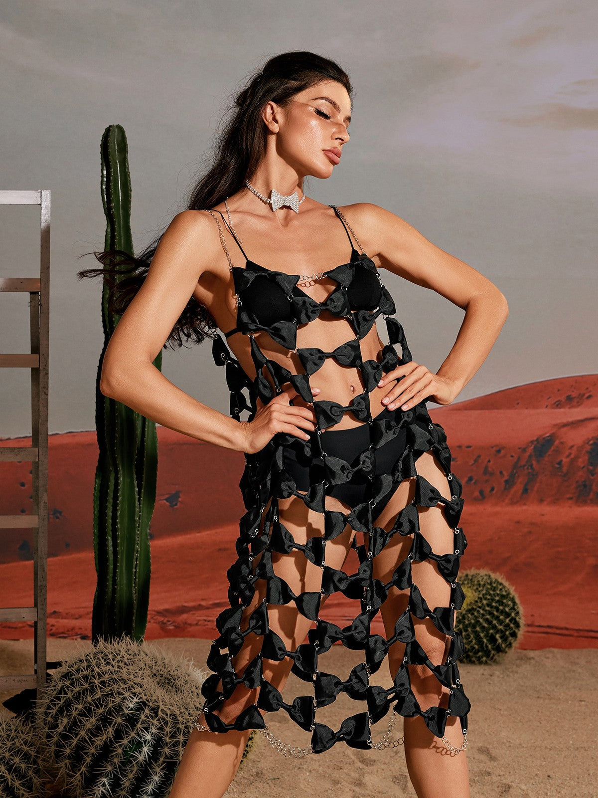 Nicolosi Spaghetti Bow Hollow Dress In Black