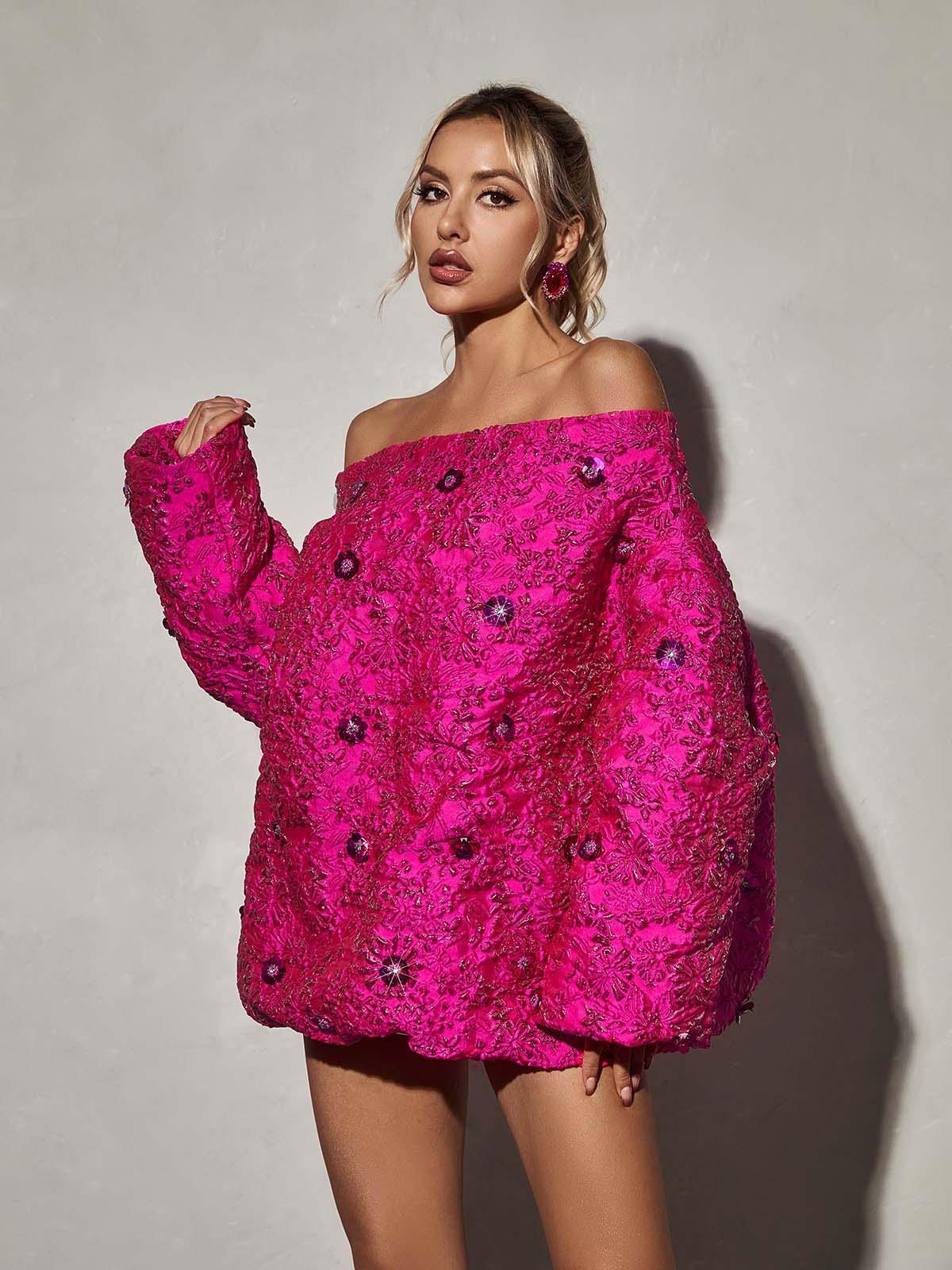Detail of the long sleeves on the Aanya Long Sleeve Jacquard Mini Dress, emphasizing its feminine style.