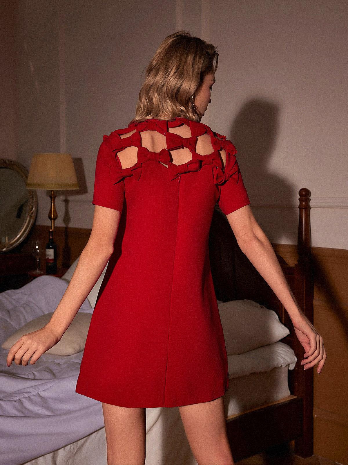 Sunni Bow Hollow Mini Dress features a stylish bow detail and hollow design, perfect for casual and formal occasions.